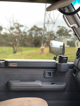 Shows armrests on passanger side of landcruiser